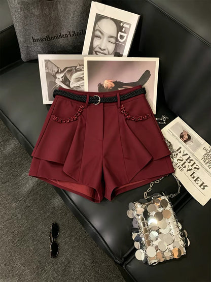 ZHOUYI High-waisted A-line wide-leg pants featuring a sophisticated red studded belt, a slimming "faux-layered" design, and anti-exposure construction.