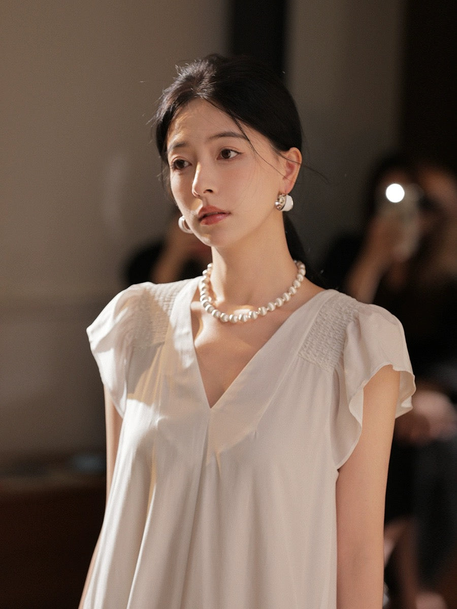 Xia Shiwen Lianlian Tea Garden V-neck loose dress women's summer simple and elegant gentle and chic white skirt
