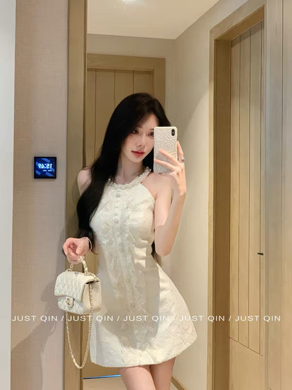 JustQin "Sassy Heiress" 2026 New Collection: Sleeveless, Short, Intricately Detailed Dress – Waist-Cinching & Slimming Fit