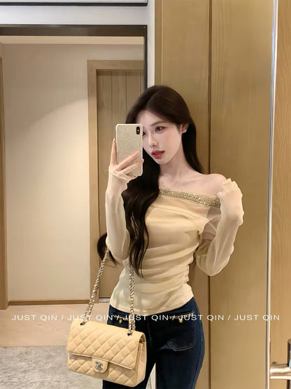 JustQin [Soft Fragrant Jade] 2026 New Autumn Women's Long-Sleeve One-Shoulder Mesh Top with Rhinestones – Elegant & Slimming Fit