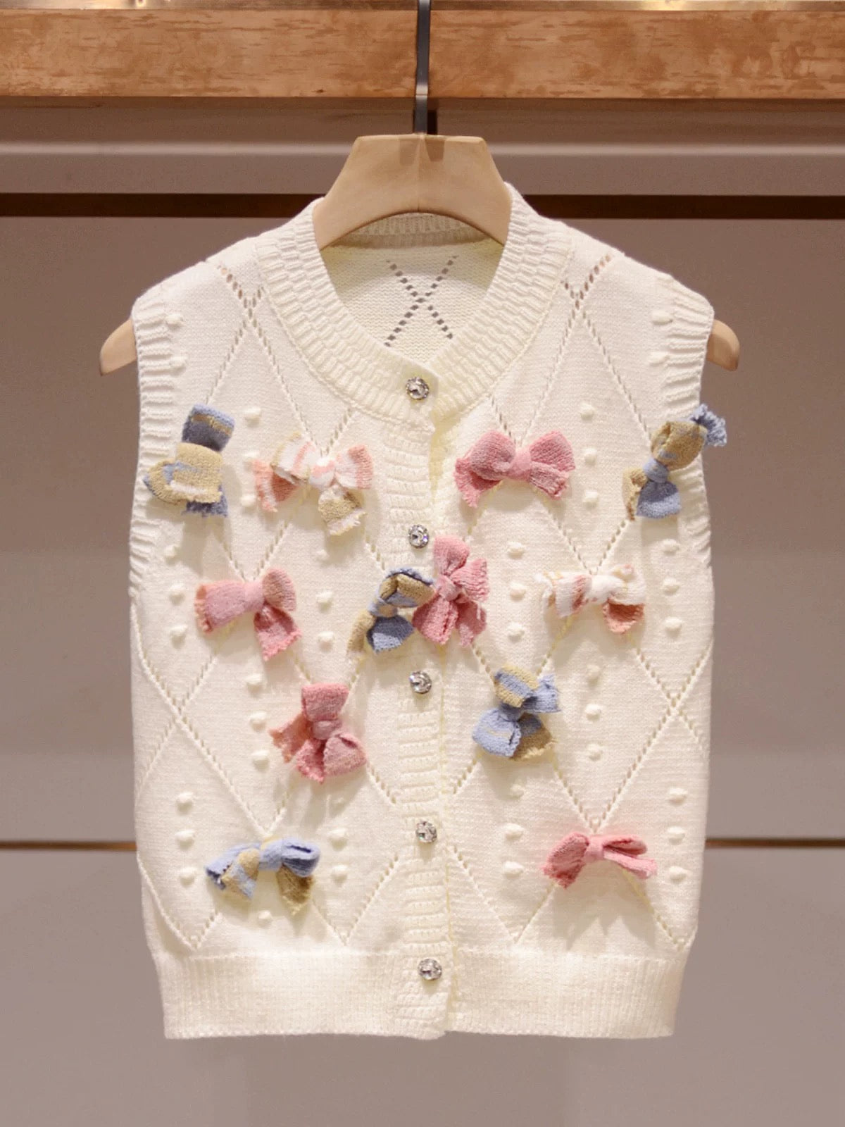 Women's temperament top winter Zhuoya 2024 new autumn bow round neck sleeveless beige cardigan vest sweater