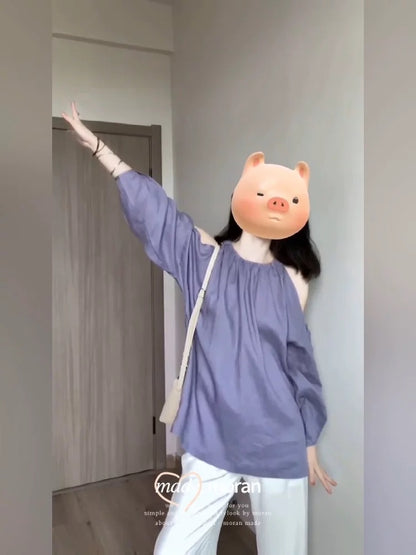 Korean chic early spring style outfit, a complete set of off-shoulder halterneck lazy tops, casual long-sleeved 2025 new styles for women