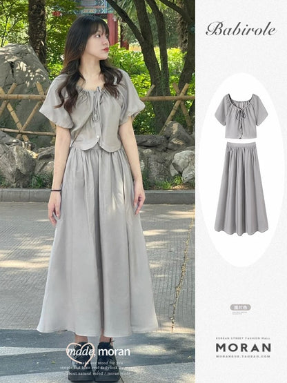 Summer clothes are paired with a complete set of fashionable puff-sleeved tops, skirts, and two-piece skirts for small people to look taller.