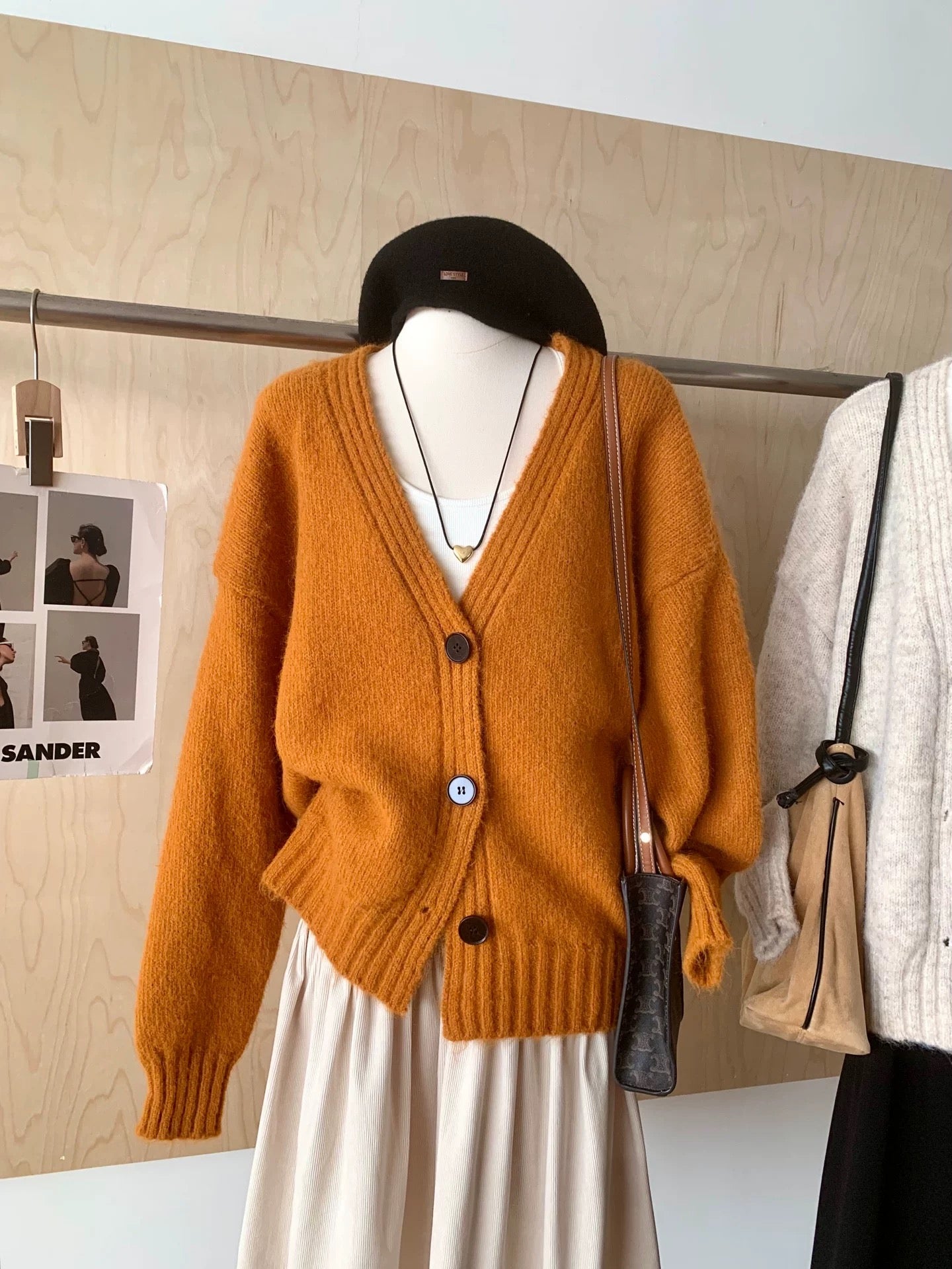 RENA lazy style V-neck knitted cardigan women 2025 autumn and winter loose sweater jacket high-end button top