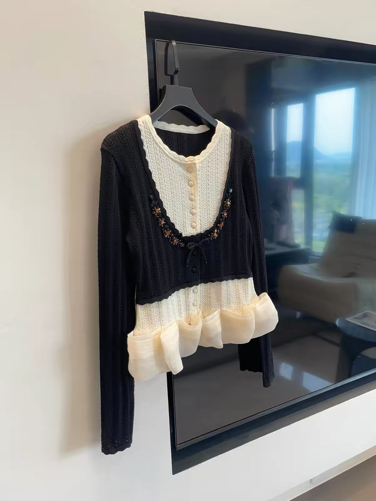 JULY START – Shenzhen-style premium knit top featuring a "faux-layered" design, high-quality craftsmanship, and an elaborate rhinestone-embellished bow.