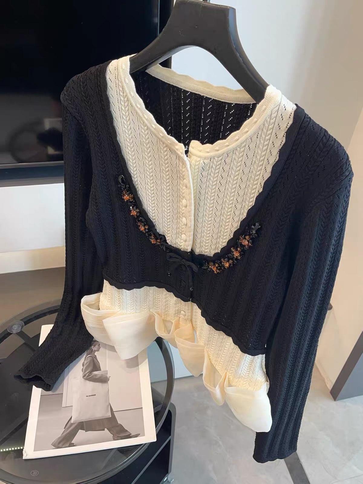 JULY START – Shenzhen-style premium knit top featuring a "faux-layered" design, high-quality craftsmanship, and an elaborate rhinestone-embellished bow.