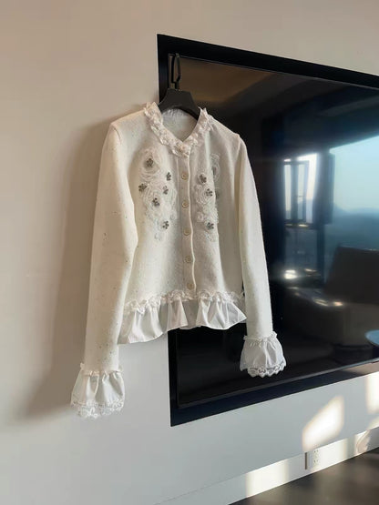 JULY START Early Spring New Arrival: Long-sleeved knit cardigan featuring 3D floral appliqués, rhinestone accents, and lace-trim detailing.