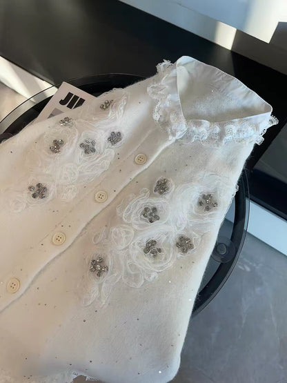 JULY START Early Spring New Arrival: Long-sleeved knit cardigan featuring 3D floral appliqués, rhinestone accents, and lace-trim detailing.