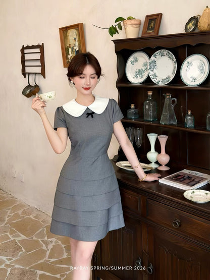Lei Yingjun's Korean-style preppy color-blocked Peter Pan collar dress for women, summer fitted waist cake skirt.