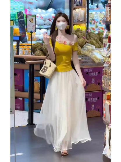 Summer's most beautiful outfit: a complete set of off-shoulder three-dimensional flower yellow T-shirt top and mid-length gauze skirt two-piece suit