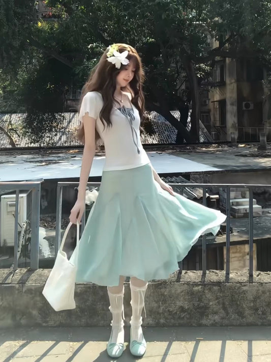 French-style gentle vacation fresh mint green two-piece women's set 2026 new summer off-shoulder short-sleeved slimming suit