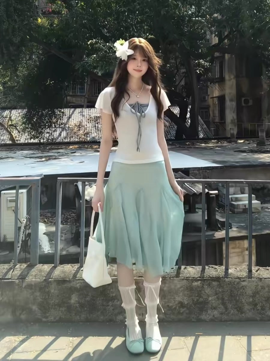 French-style gentle vacation fresh mint green two-piece women's set 2026 new summer off-shoulder short-sleeved slimming suit