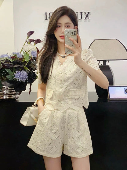 French V-neck hollow embroidery small fragrance suit for women 2024 new small lace wide-leg shorts two-piece set
