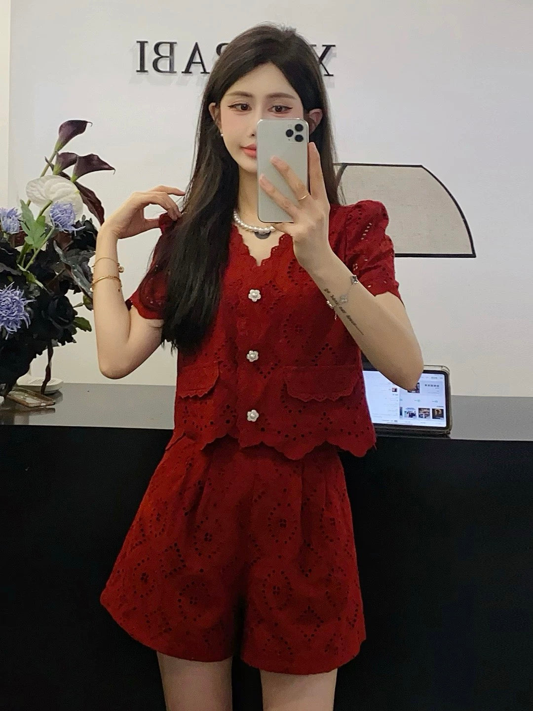 French V-neck hollow embroidery small fragrance suit for women 2024 new small lace wide-leg shorts two-piece set