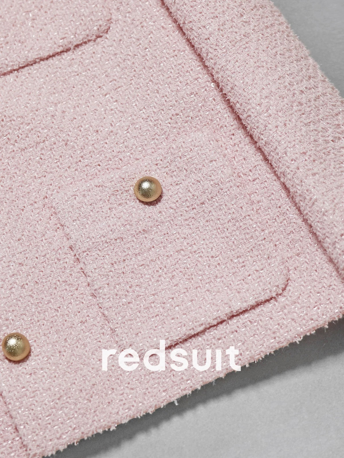 Redsuit, a sweet and youthful tweed jacket with four pockets and gold buttons, featuring a Chanel-inspired design and a sweet and elegant style.