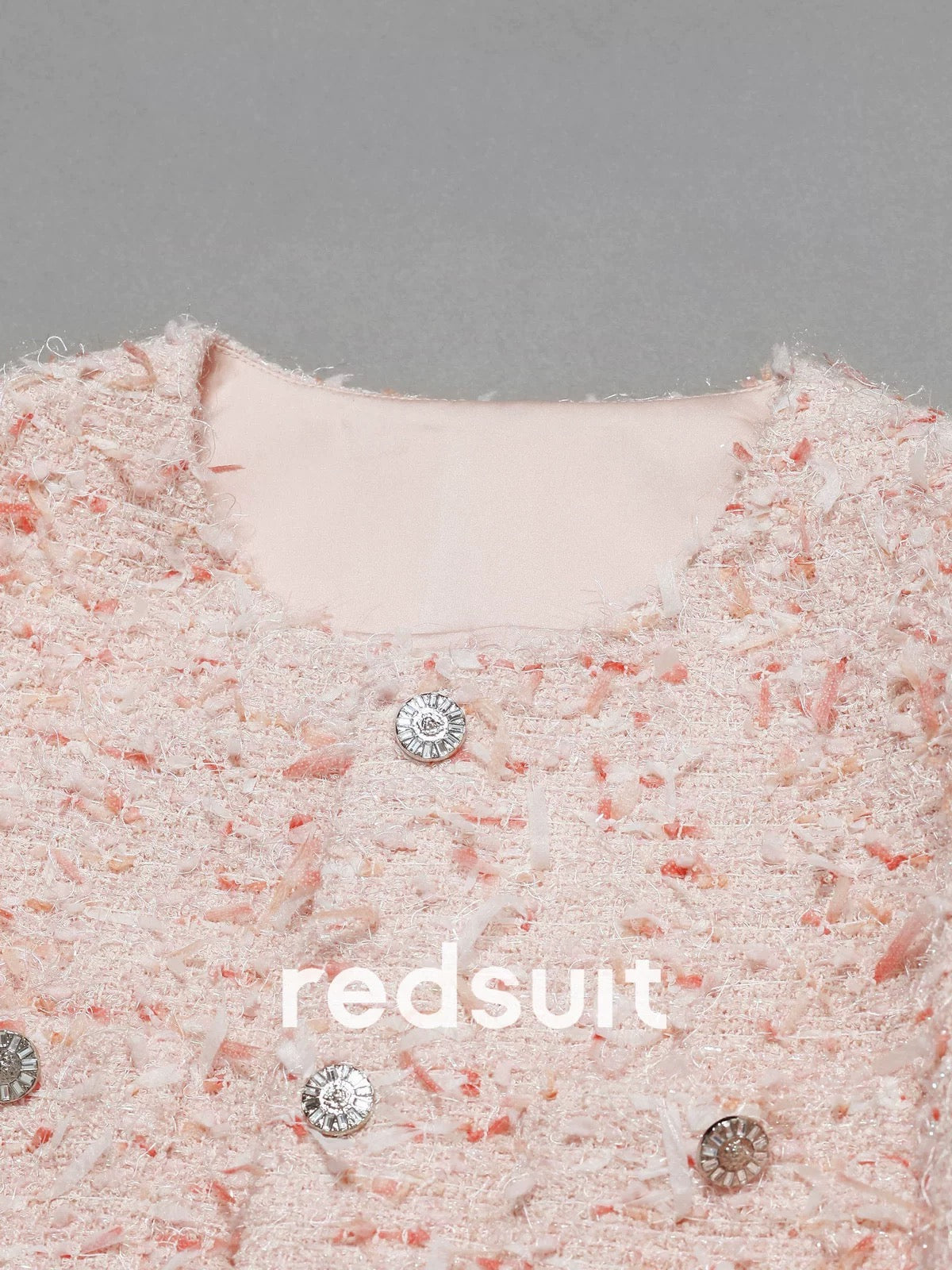 Redsuit's "King of Bombs" handmade butterfly-patterned tulle cherry blossom pink high-end Chanel-style jacket and sweet top.