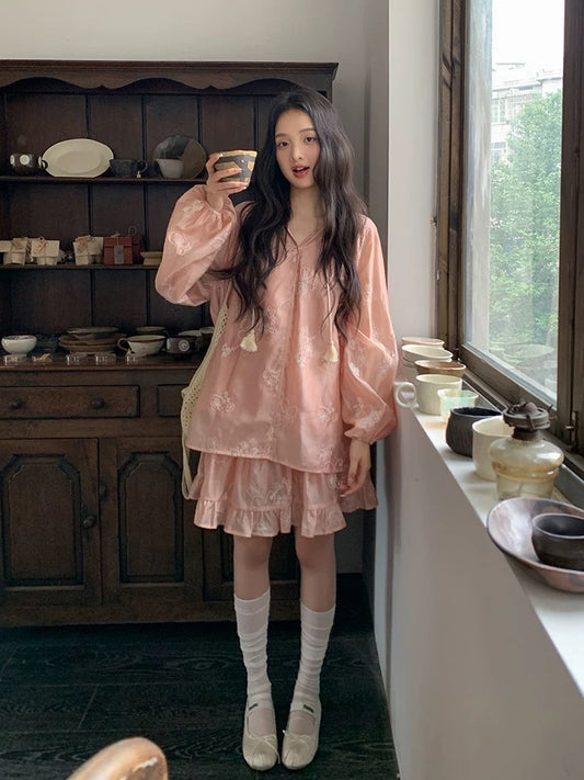 Find a sophisticated two-piece set for women, featuring a sheer, shimmering shirt and skirt in a modern Chinese style, perfect for spring.