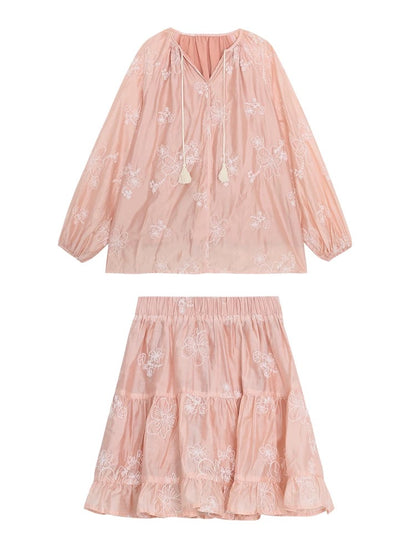 Find a sophisticated two-piece set for women, featuring a sheer, shimmering shirt and skirt in a modern Chinese style, perfect for spring.