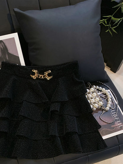 ZHOUYI/Monday: A stylish polka dot PU leather mini skirt with metal buckle, perfect for autumn and winter. It's a high-waisted skirt that flatters the figure.