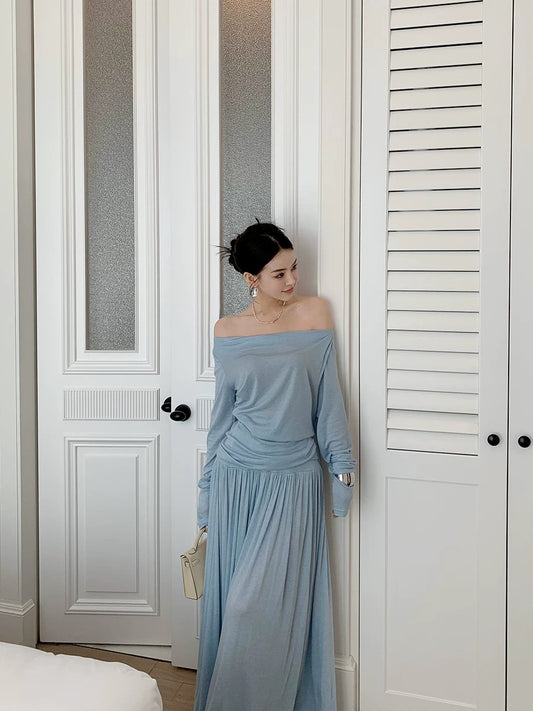Feng Xinying wears a complete set of women's clothing in early spring 2025 new long-sleeved knitted top + mid-length skirt