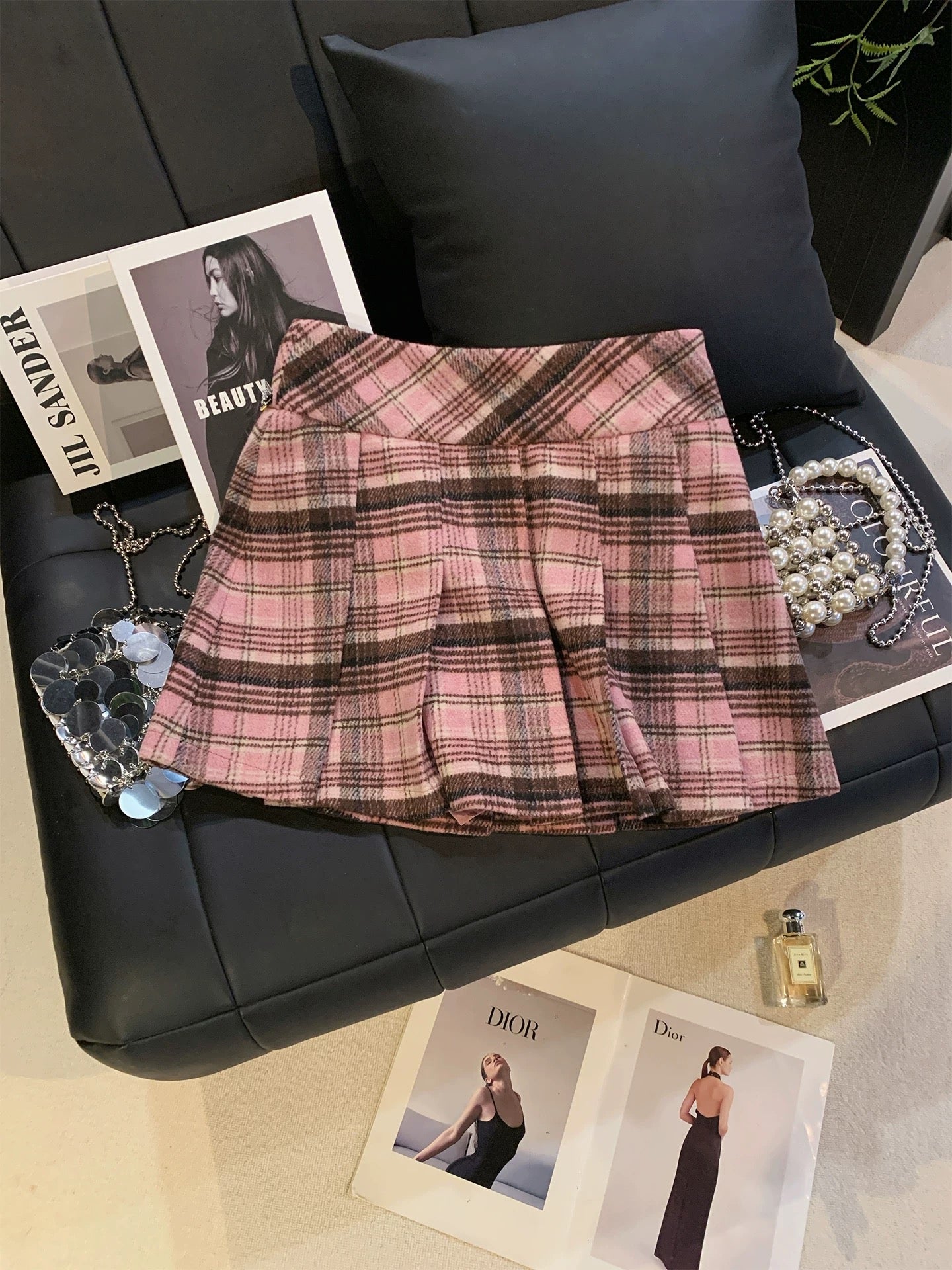 ZHOUYI/Monday: A gorgeous pink plaid rhinestone-embellished mini skirt, high-waisted and elegant A-line style perfect for autumn and winter.