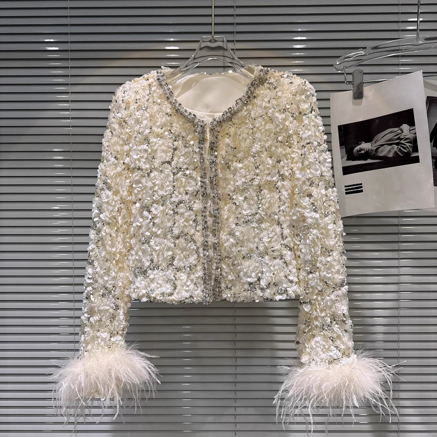 Popular online style, 2025 winter new light luxury elegant ostrich feather sleeve sequined cotton-padded short jacket top for women.