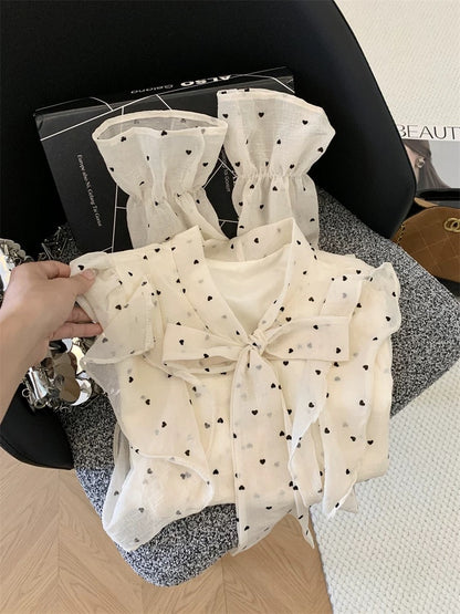 Jade Closet flagship store recommendation: A sophisticated French-style sweet long-sleeved babydoll blouse with a tie bow.