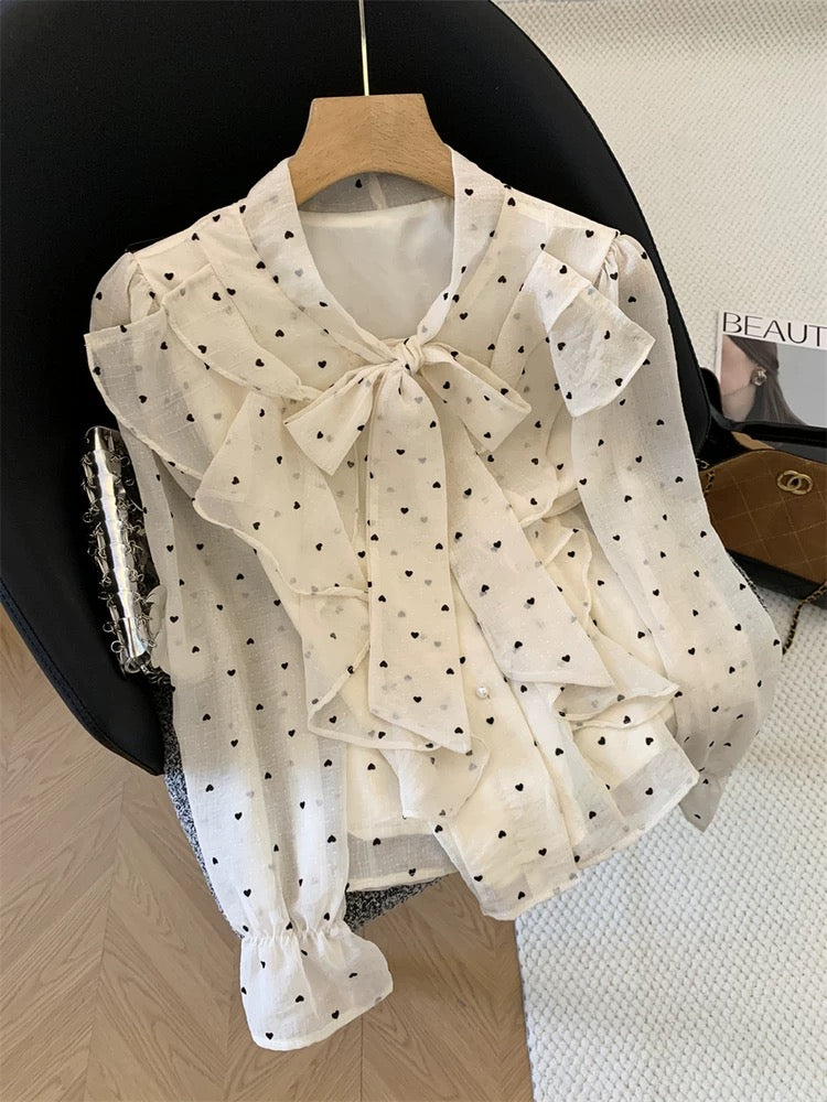 Jade Closet flagship store recommendation: A sophisticated French-style sweet long-sleeved babydoll blouse with a tie bow.