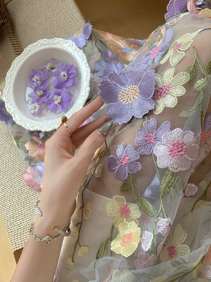 Han Yulin's exquisite 3D floral Mori-style halter maxi dress, romantic and ethereal for vacation.