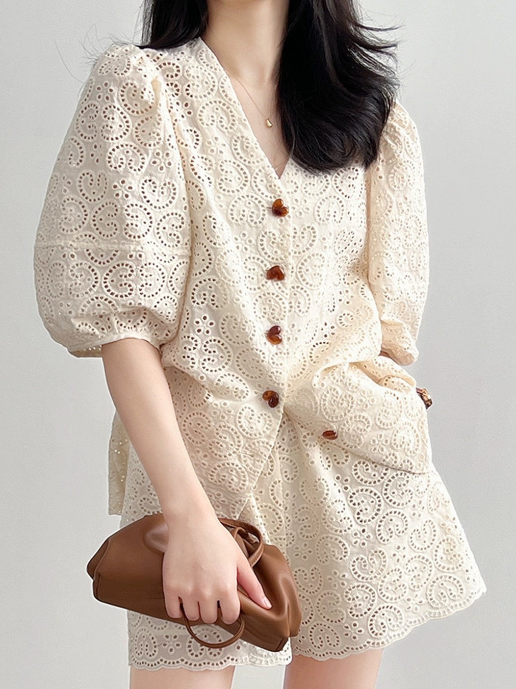 Xiaoxiangfeng French shorts suit for women, summer lace crocheted puff sleeve top, wide-leg pants, casual and fashionable two-piece set