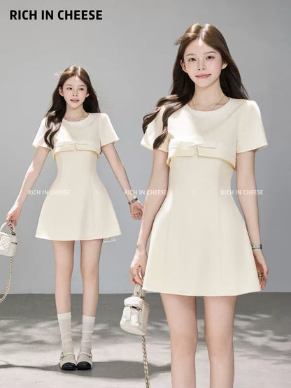 Jinchuanchuan Miss Betty – Korean-style summer "Old Money" aesthetic spliced faux-two-piece short-sleeve waist-cinching dress.
