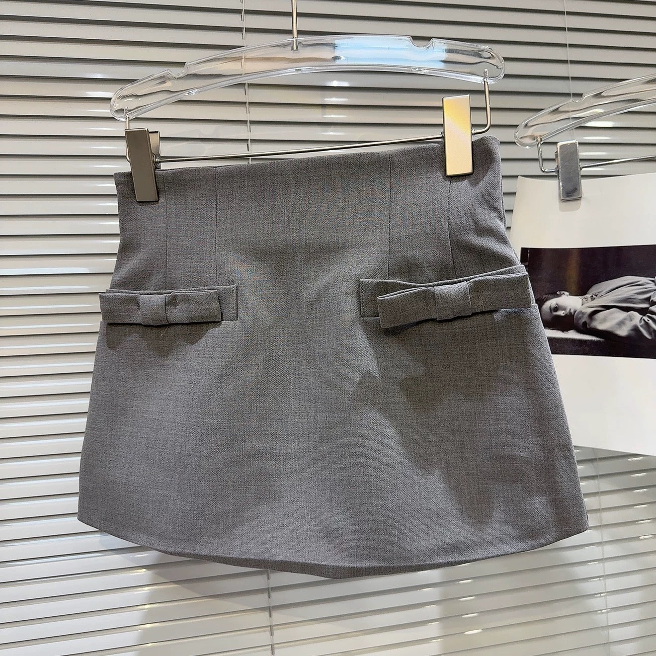 Popular online style, 2025 autumn new arrival, elegant and sophisticated high-waisted A-line mini skirt with 3D bow design.