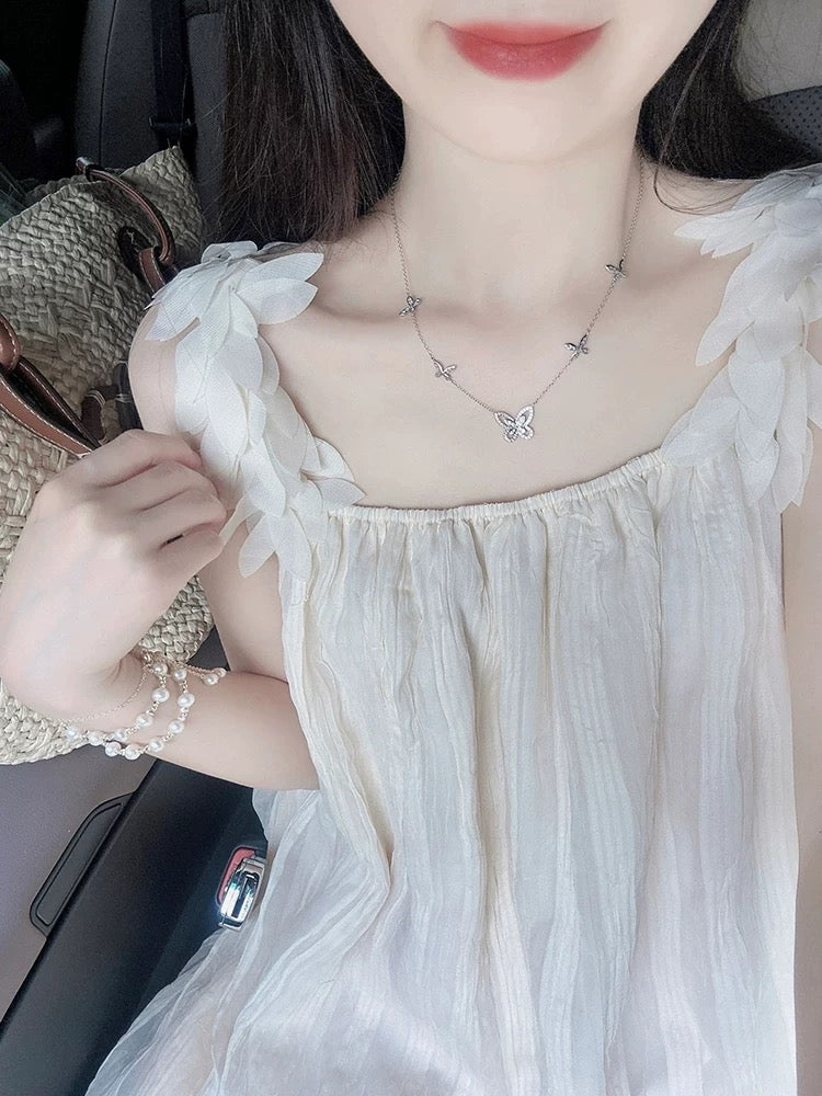 Summer vacation style fairy square neck suspender dress women's new texture exquisite first love loose mid-length skirt
