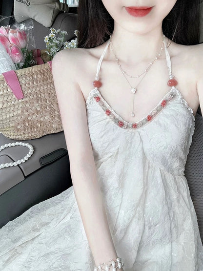 French pure lust style V-neck halterneck fairy dress summer new textured waist A-line mid-length skirt