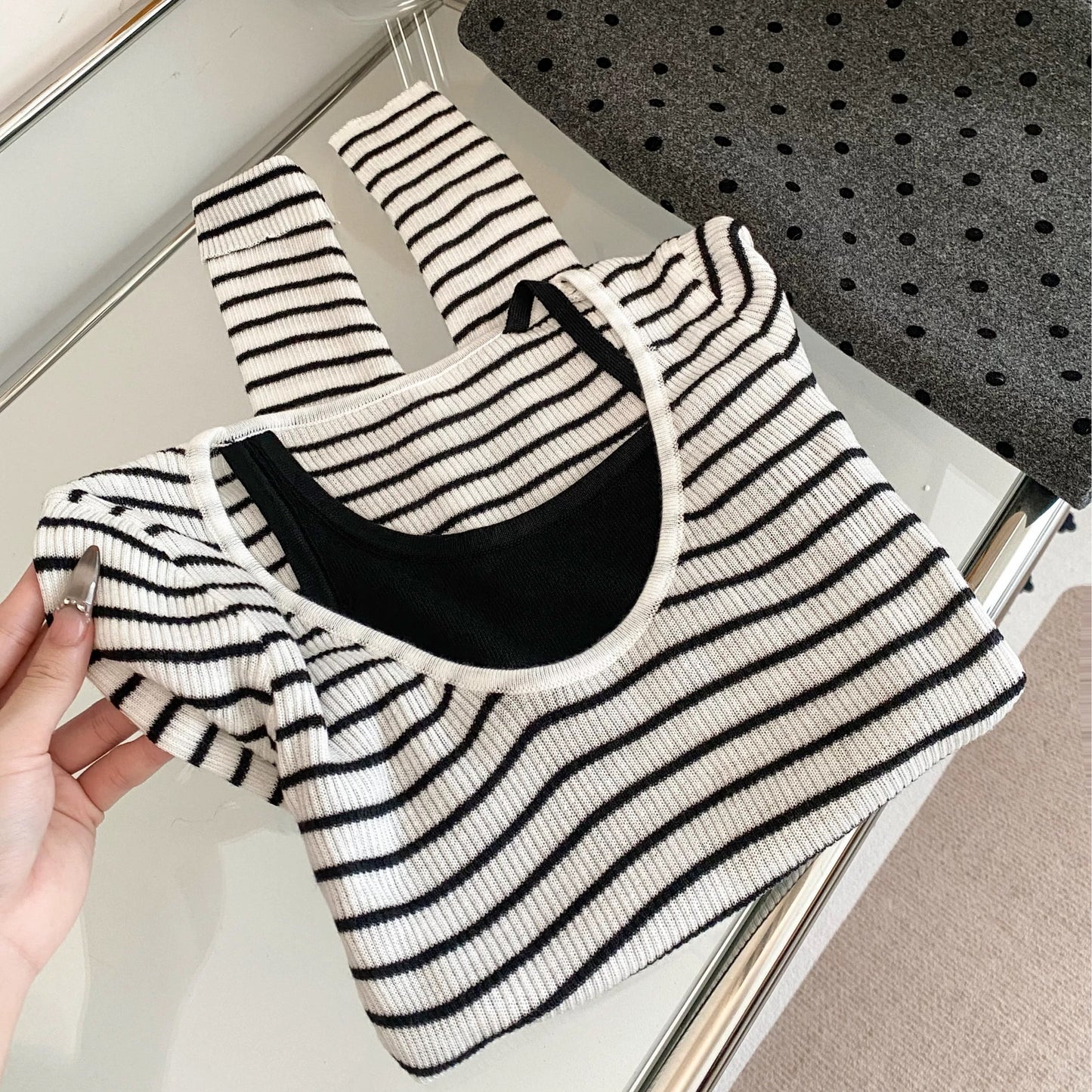 A must-have! This Korean-style striped patchwork faux two-piece knit top is a new autumn style for women, exuding a sophisticated and slimming feel.