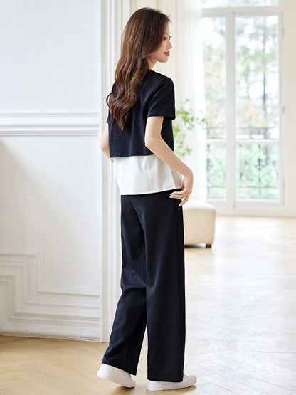 Mohan Yimei casual and fashionable fake two-piece contrasting color splicing suit 2024 summer new deconstructed split suit