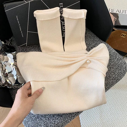 A must-have! This beaded off-the-shoulder long-sleeved knit sweater is a new autumn style for women, exuding a sophisticated and elegant off-the-shoulder look.