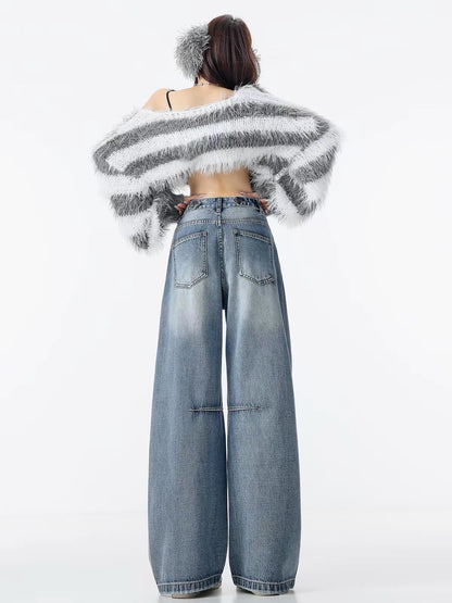 ABWLR Sea Salt Soda – Original vintage-style, distressed light-blue wide-leg jeans featuring exposed stitching and a floor-length cut.