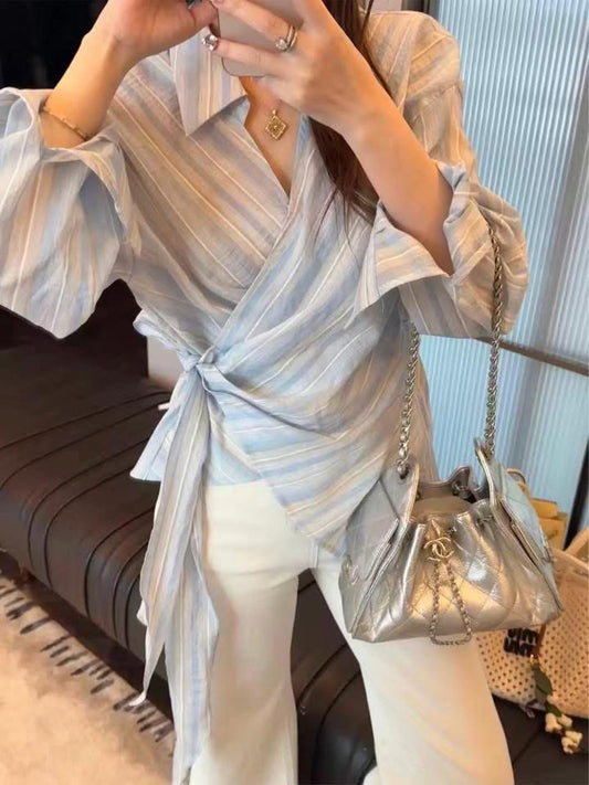 Yululu's uniquely designed tie-waist blue striped long-sleeved shirt for women, a new summer style for 2026.