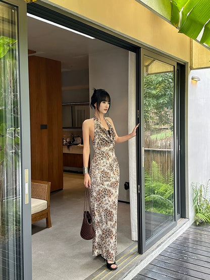 VENUIE slim fit leopard print mesh dress with a swaying collar, elegant and fashionable, with a halter neck and backless waist-hugging long skirt