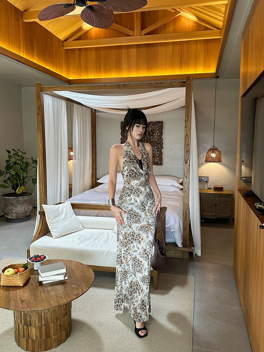 VENUIE slim fit leopard print mesh dress with a swaying collar, elegant and fashionable, with a halter neck and backless waist-hugging long skirt