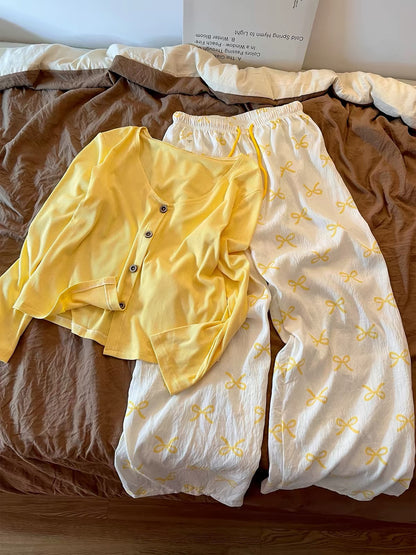 Korean-style yellow camisole pajama set for women (Autumn 2026 new arrival)—includes a cardigan and trousers; suitable for lounging or casual outings.