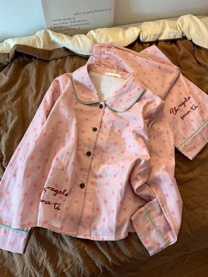 Women's Korean-style pink polka-dot long-sleeved pajama set—suitable for lounging or casual outings—featuring long pants; new for Autumn 2026.