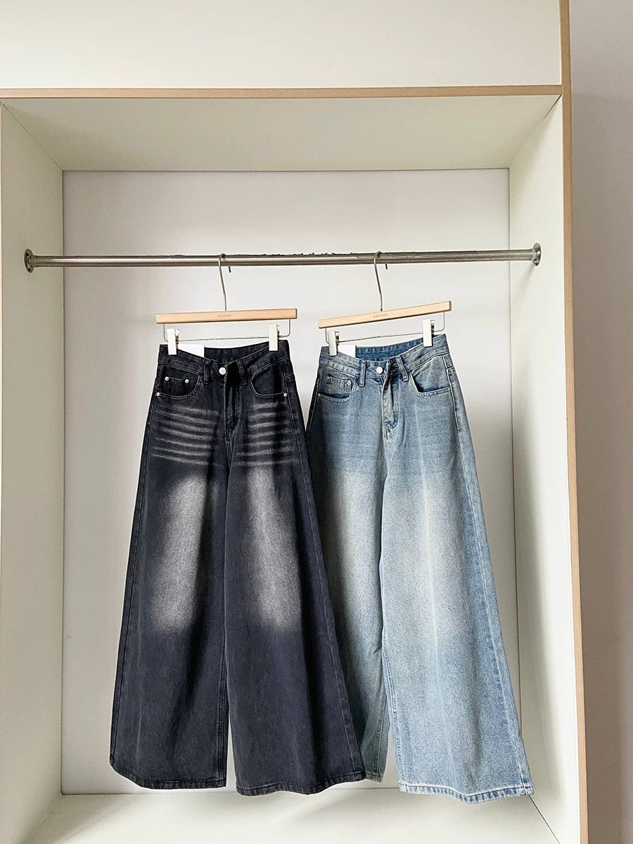 Vertical drape, high-waisted, hip-covering, slimming women's jeans, 2025 autumn new Korean style, versatile blue wide-leg trousers.
