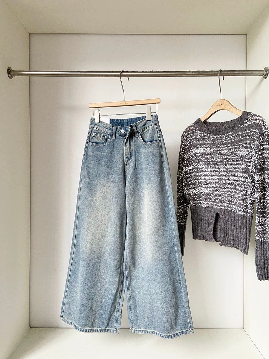 Vertical drape, high-waisted, hip-covering, slimming women's jeans, 2025 autumn new Korean style, versatile blue wide-leg trousers.