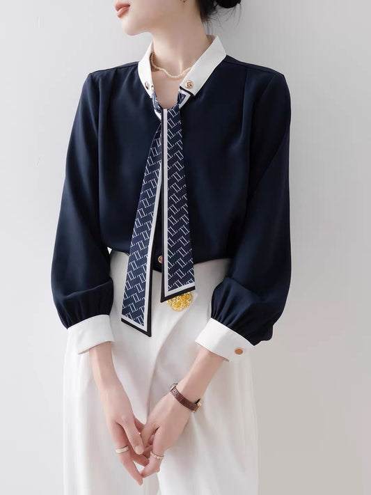 Women's French-style navy blue loose-fit shirt—a stylish, distinctive top for autumn, suitable for professional and office wear (2026 New Collection).