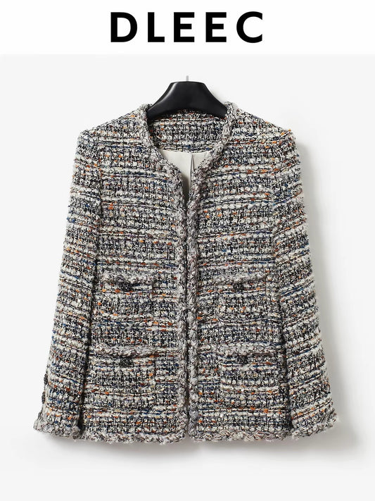 DLEEC Vintage-style, four-pocket, boxy-fit tweed jacket in a multi-colored weave—a sophisticated, mid-length statement piece.