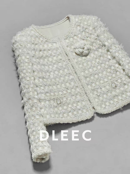 DLEEC – Unique and distinctive! A "-style" jacket in a creamy apricot hue, featuring a textured, iridescent plaid pattern.