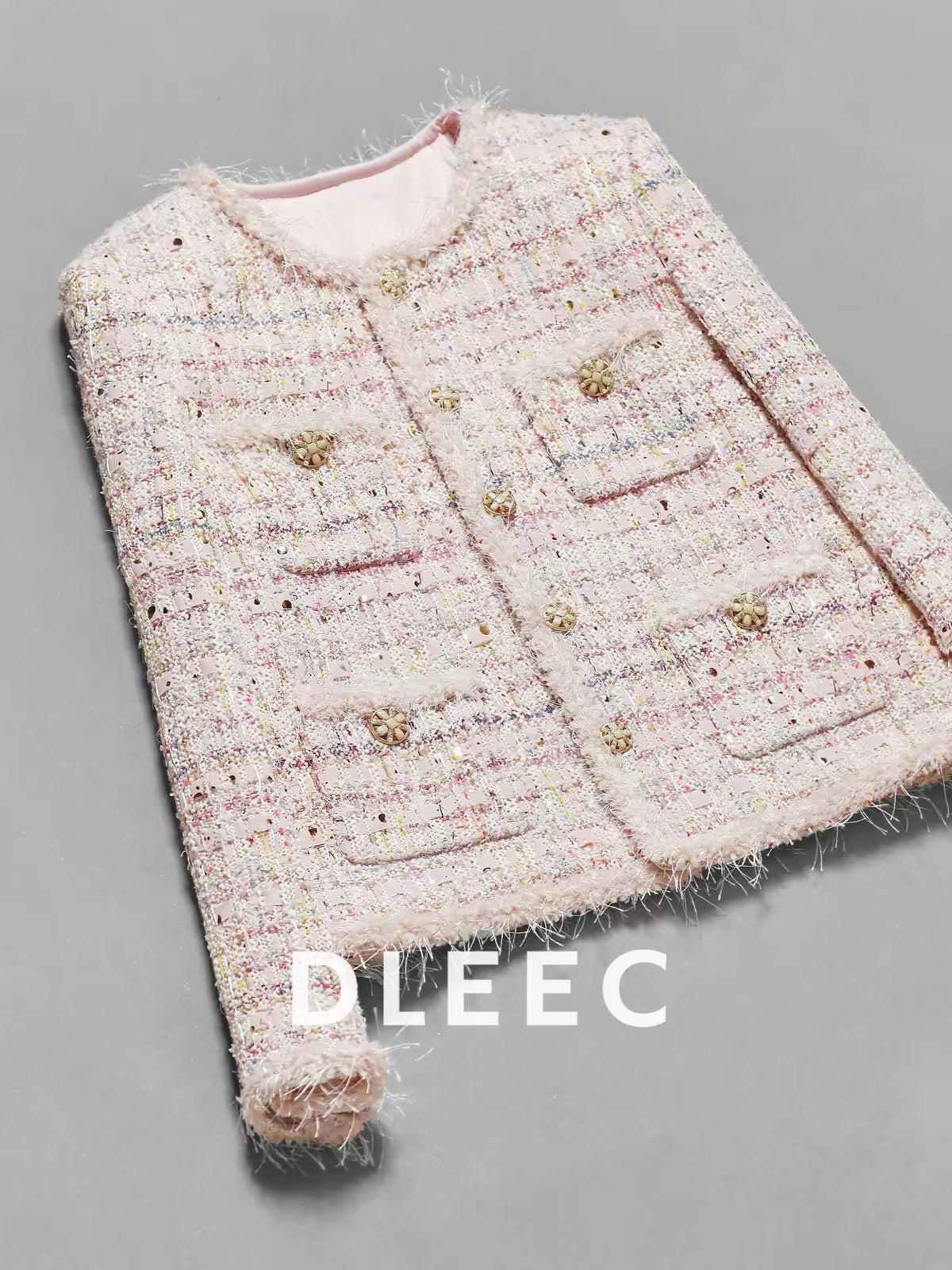 DLEEC Romantic Vibe – Pink Tweed "-Style" Jacket: A Youthful, Sophisticated Piece Featuring Intricate Craftsmanship, Sequins, and Fancy Textured Yarn.