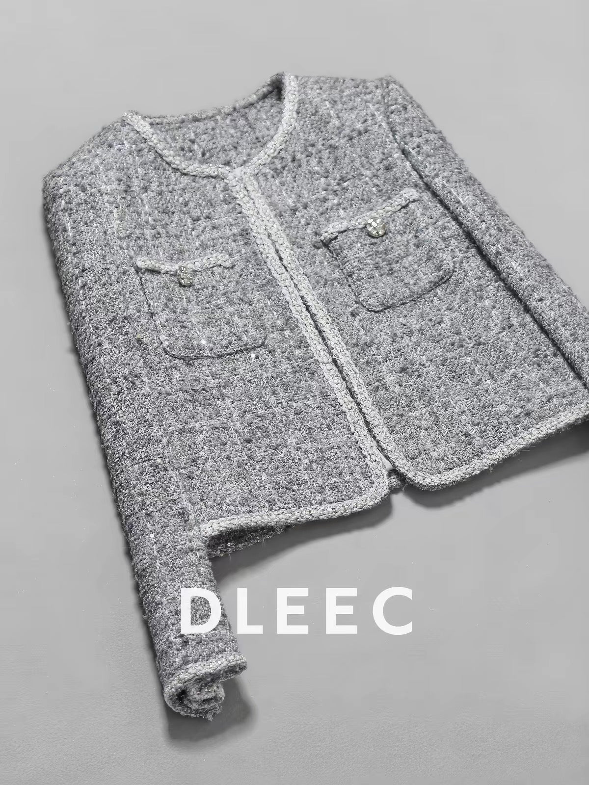 DLEEC Premium Tweed Jacket – Sophisticated "-Style" Round-Neck Top in High-End Grey, Featuring Intricate Rhinestone-Embellished Lace Trim and Luxe Craftsmanship.